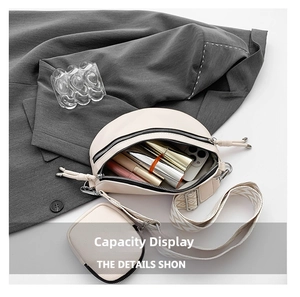 Interior view showing the large capacity of the beige crossbody bag for phone and makeup