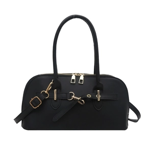 Retro black faux leather shell crossbody bag with golden hardware and top handles