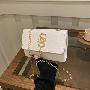 White textured shoulder bag with golden double-S logo and elegant chain strap for women
