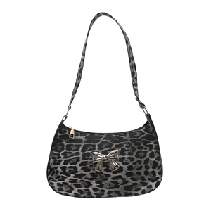 Winter leopard print baguette shoulder bag with silver metallic bow on white background