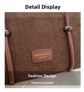 Detail of brown corduroy bag showing fine texture and a leather fashion logo patch
