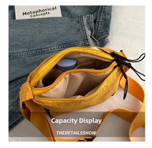 Internal layout of yellow waterproof travel bag showing large capacity and multi-pocket storage
