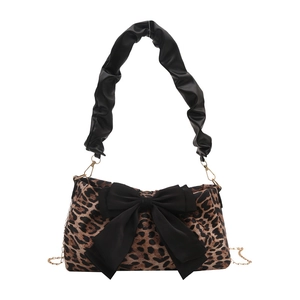 Borsa a mano retrò leopardata con un grande fiocco nero e una tracolla a catena d'oro