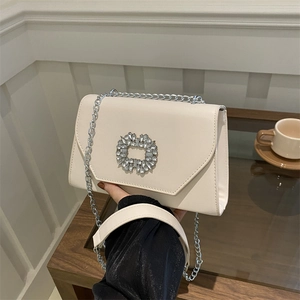 Chic cream white square crossbody bag with sparkling diamond buckle and silver chain strap