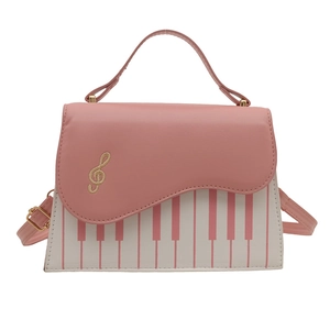 Pink and white piano key crossbody bag with musical note embroidery for women