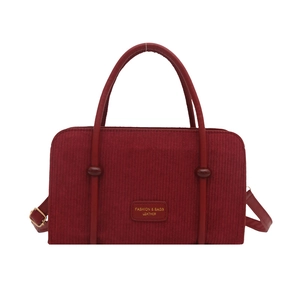 Retro corduroy tote bag in deep wine red with leather handles and adjustable shoulder strap
