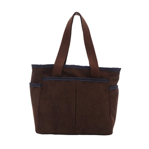 Retro dark brown corduroy tote bag with multiple pockets and navy blue trim detail