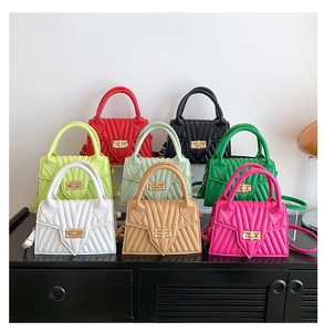 Collection of vibrant PU leather handbags featuring V-shaped quilting and gold twist-locks