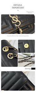 Detail of black quilted leather bag with gold magnetic buckle and metal chain strap