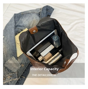 Large capacity tote bag internal view showing storage for tablet and cosmetics