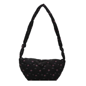 French style black quilted canvas bag with pink floral patterns and a cloud silhouette