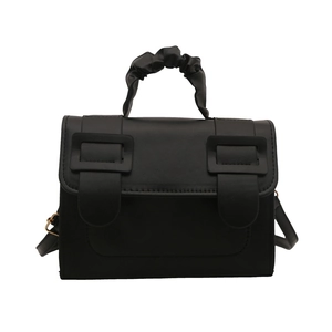 Chic black pleated handbag with contrast stitching and decorative square buckles