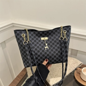 Vintage monogram tote bag with gold chain strap and deer pendant decoration