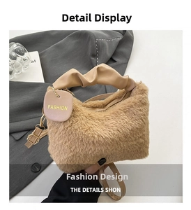 Detail of soft khaki plush crossbody bag with ruched leather handle and zipper