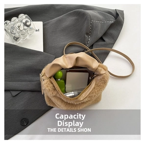 Interior storage capacity of the khaki plush shoulder bag showing personal items
