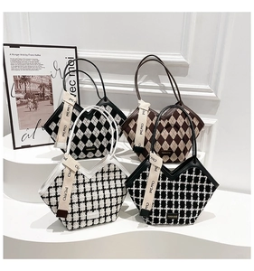 Close-up of four plaid tote bags featuring V-shaped openings and decorative ribbon handles