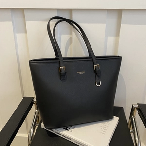 Classic black Saffiano leather tote bag with gold logo and spacious interior for daily commute