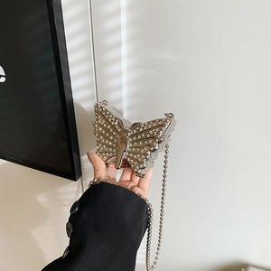 Pochette de soirée élégante en forme de papillon avec strass brillants et chaîne argent