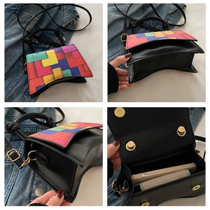 Macro view of mini square crossbody bag showing colorful patchwork and dual gold magnetic buckles