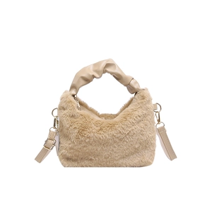 Furry plush handbag with scrunchie leather handle and adjustable shoulder strap in apricot
