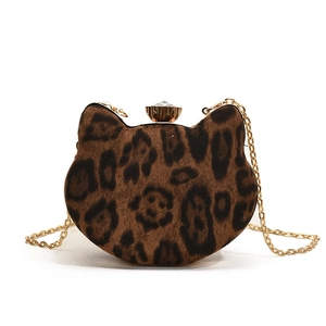 Mini leopard print cat-shaped chain crossbody bag with a golden gemstone clasp closure