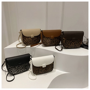 Detail of five leopard print patchwork shoulder bags with magnetic buckles in a tier layout
