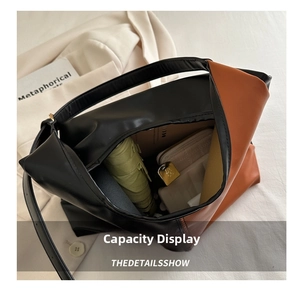 Large capacity tote bag with color block design showing interior storage for daily items