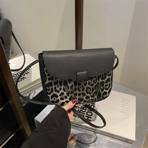 Retro leopard print crossbody bag with black leather flap and square buckle detail