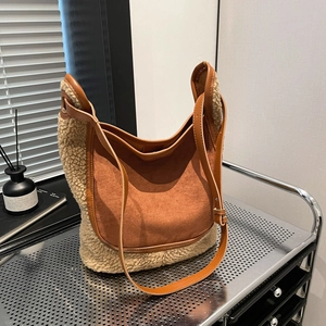Sac seau vintage en daim et laine de mouton avec bandoulière en cuir pour femme