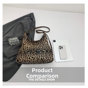 Leopard print hobo tote bag shown with a tablet and phone for size comparison