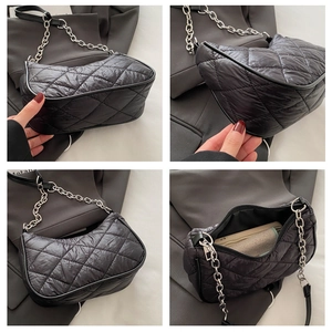 Detailed views of black quilted puffer shoulder bag with silver chain strap and zip closure