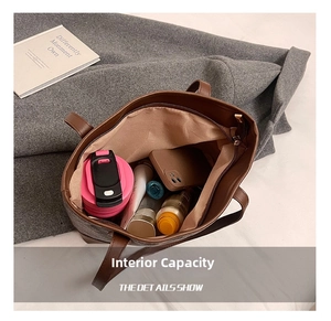 Top view of spacious tote bag interior showing large capacity and zipper closure
