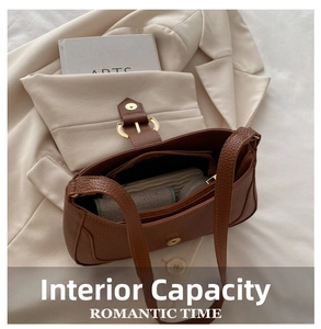 Top view of brown lychee texture bag showing spacious internal capacity and pocket