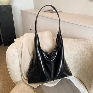 Glossy black hobo shoulder bag with large capacity and soft faux leather texture