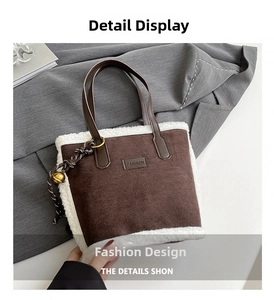 Detail of brown suede bucket bag with white faux shearling trim and fashion leather tag