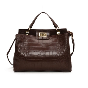Classic dark brown crocodile embossed tote bag with top handle and gold twist lock clasp