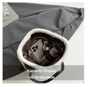 Top view of bucket bag showing large interior capacity for phone and cosmetics