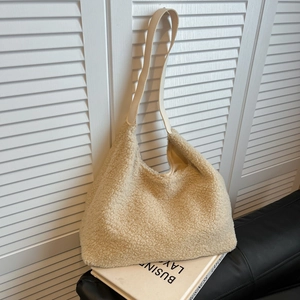 Minimalist beige plush hobo shoulder bag with leather strap for autumn winter fashion