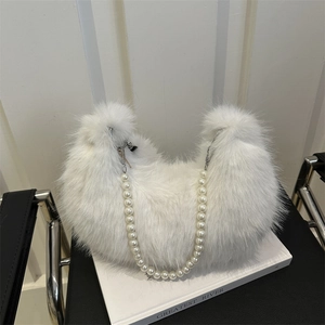 Chic white fuzzy plush hobo bag with pearl chain strap and minimalist silver hardware