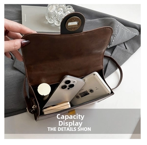 Internal storage view of the brown retro flap bag with phone and daily essentials