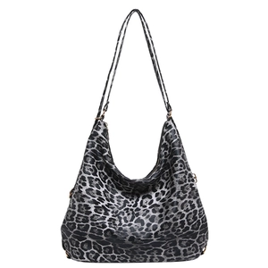 Large leopard print hobo bucket bag with soft grey leather straps and spacious design