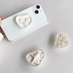 Vintage floral and angel embossed resin phone grip stand in pearlescent white finish