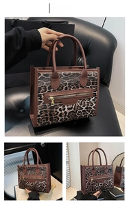 Detail of coffee leopard print tote bag with gold zipper and premium leather trim