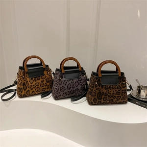 Fashion leopard print handbag collection with round top handle and crossbody strap
