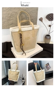 Detail view of khaki suede bucket bag with white faux fur trim and fashion patch