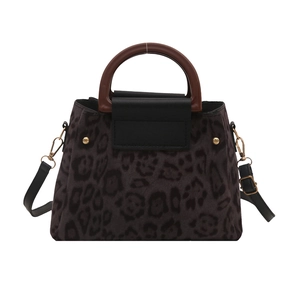 Retro leopard print handbag with round brown top handles and gold-toned hardware details