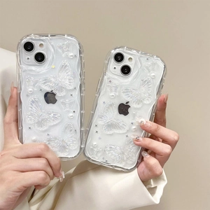 Transparent wavy iPhone case with 3D white butterflies, pearls, and glitter sequins