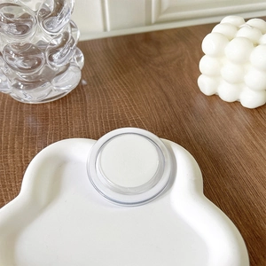 Minimalist white magnetic phone grip on cloud-shaped tray with aesthetic setup