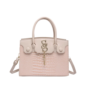 Pink beige crocodile pattern handbag with gold metal logo and tassel accents