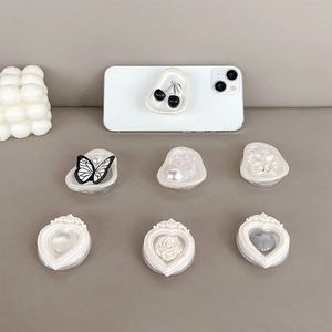Minimalist cream-style phone grip socket set with cherry and butterfly relief designs